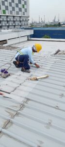metal roof waterproofing work in progress