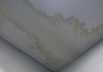 Severe water stain on a ceiling requiring diagnosis and repair by an expert waterproofing specialist.